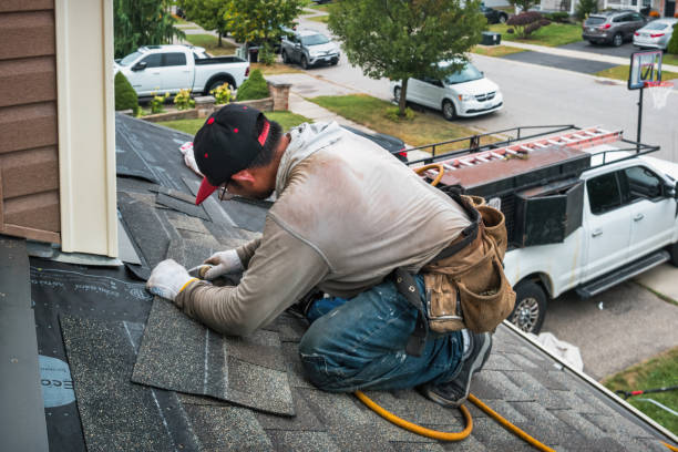 Professional Roofing technician working in Brockton, PA